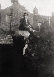 Bernard Hubbard, aged 10, sitting on the bomb shelter. A year before the bomb fell.